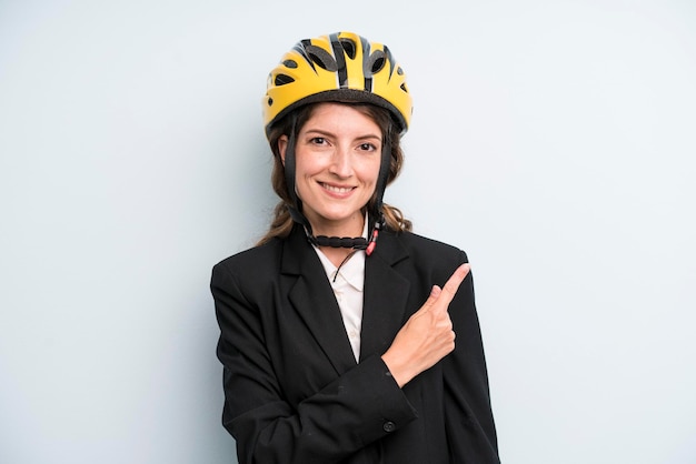 Young adult pretty woman with a bike helmet