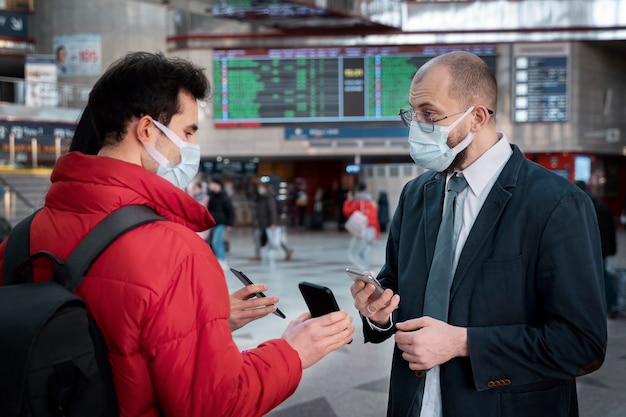 Young adult traveling with vaccination passport