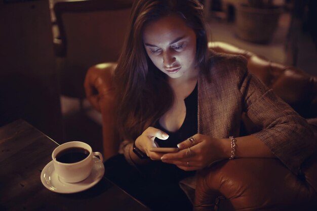 young adult woman, coffee telephone restaurant