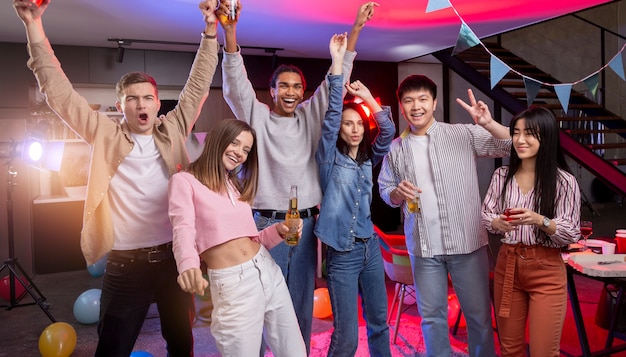 Young adults having a party at home