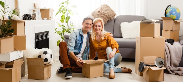 Young adults moving in new home