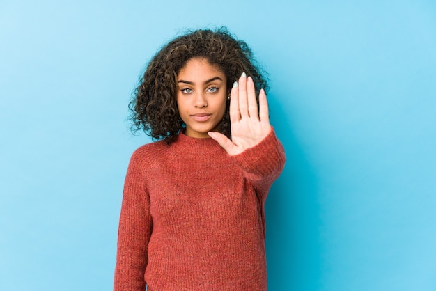 Young african american curly hair woman