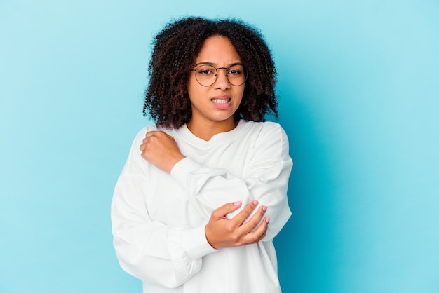 Young african american curly woman expressing emotions isolated