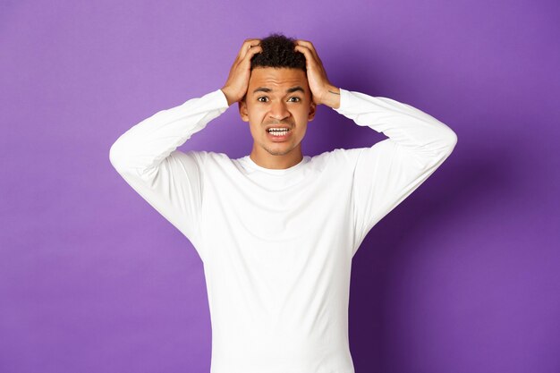 Young African-American guy posing