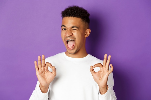 Young African-American guy posing