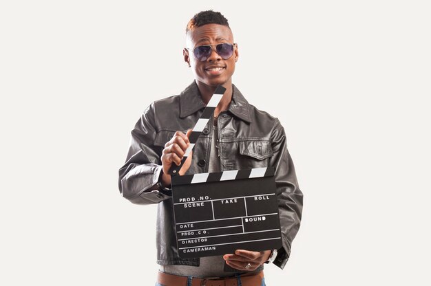 Young African American Man Holding Video Film Clapboard