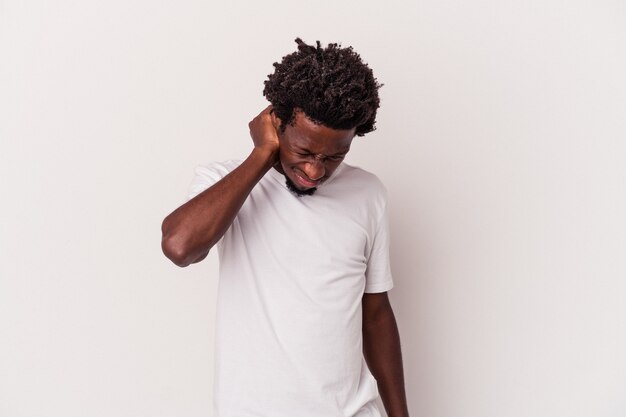 Young african american man isolated on white background  having a neck pain due to stress, massaging and touching it with hand.