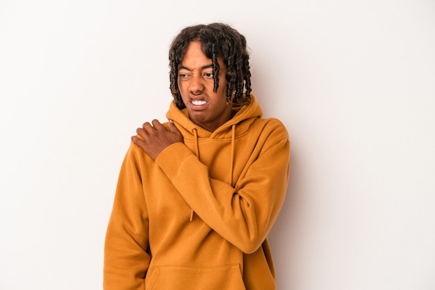 Young african american man isolated on white background having a shoulder pain.