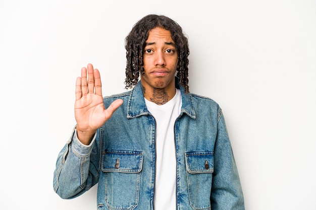 Young African American man isolated on white background smiling cheerful showing number five with fingers