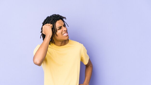 Young african american man looking confused