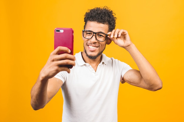 Young African American man taking selfie