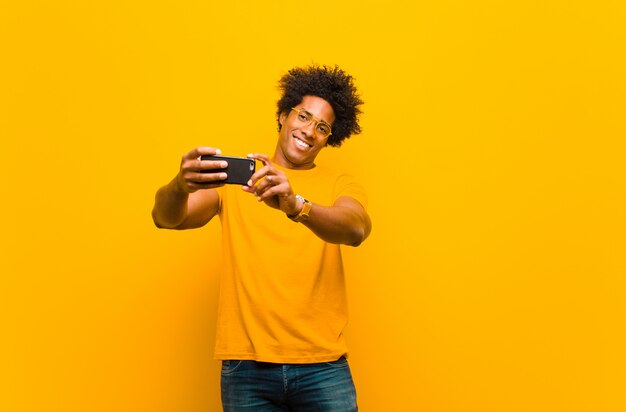 Young african american man with a smart phone