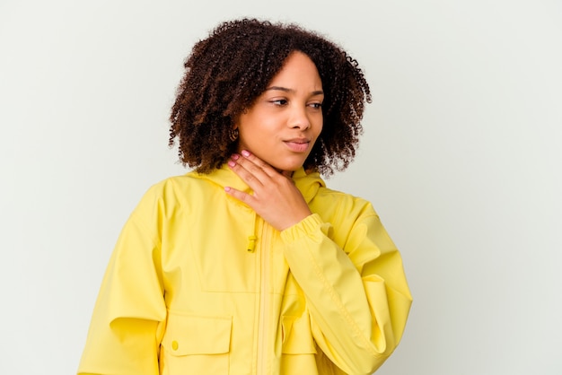 Photo young african american mixed race woman isolated suffers pain in throat due a virus or infection.