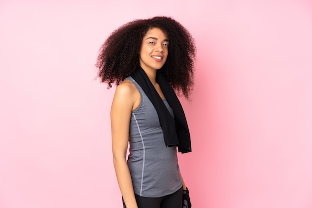 Young african american sport woman with sport towel