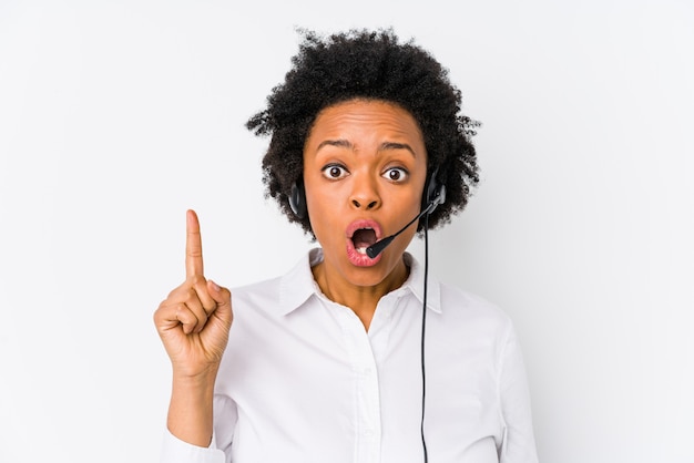 Young african american telemarketer woman having some great idea