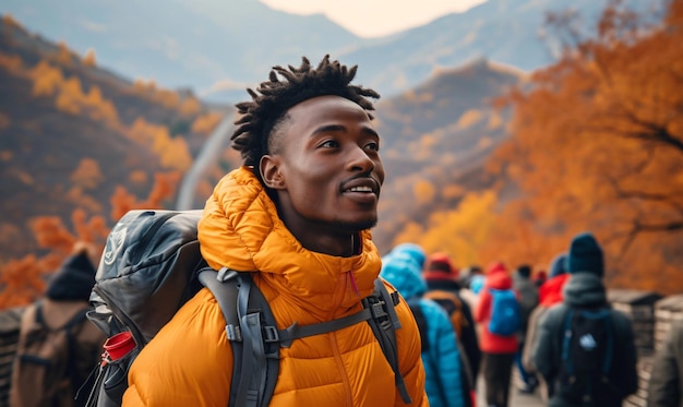 Young african american tourist man with backpack on Great Wall of China