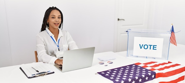 Young african american woman smiling confident working at electoral college