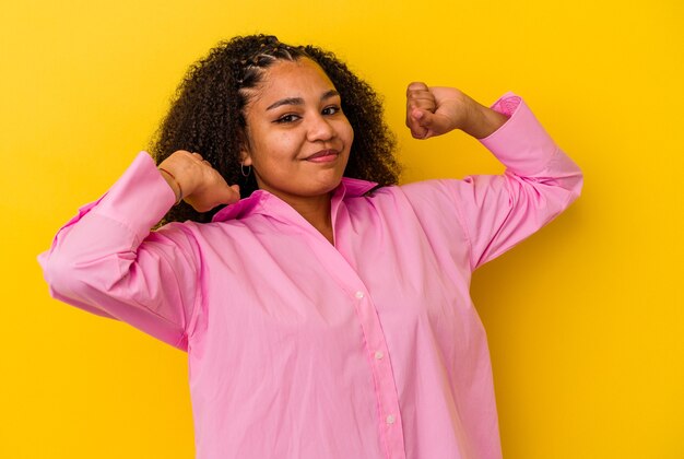 Young african american woman  stretching arms, relaxed position.