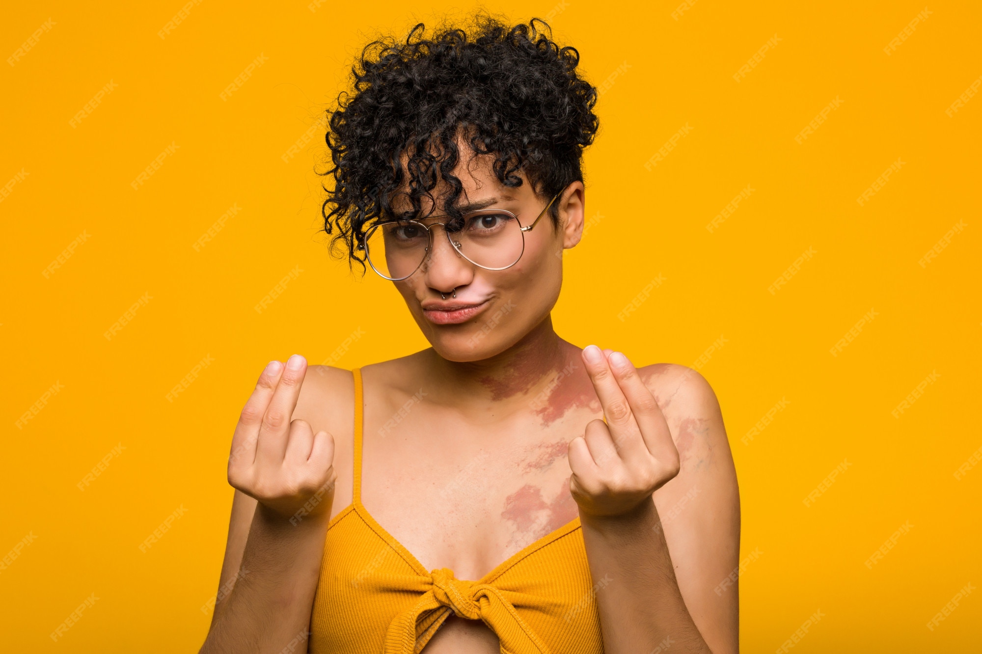 Premium Photo | Young african american woman with skin birth mark showing  that she has no money.