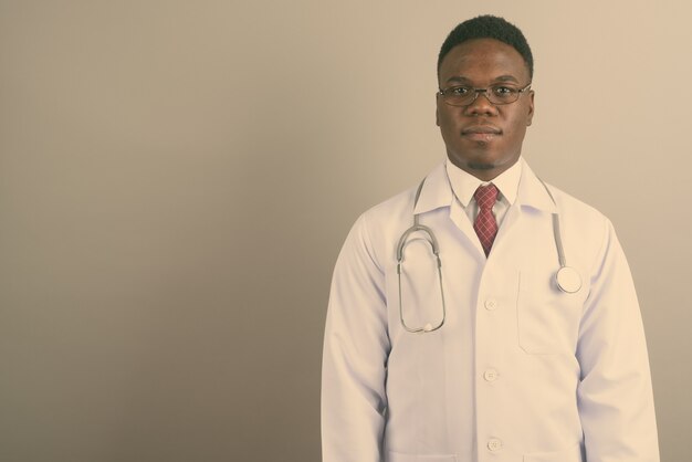 young African man doctor wearing eyeglasses