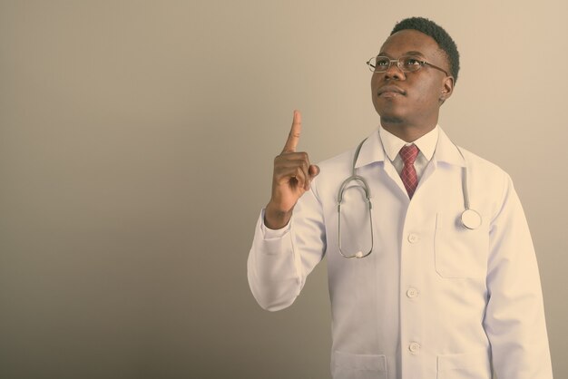 young African man doctor wearing eyeglasses