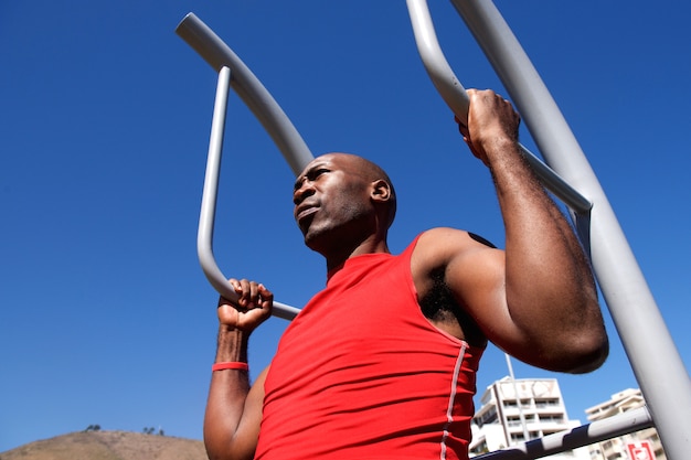 Young african man exercising outdoors