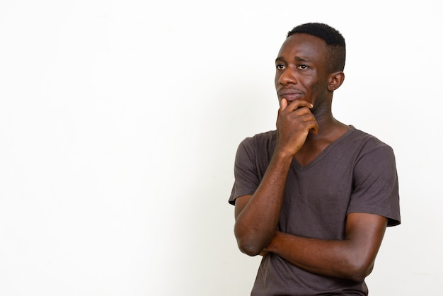 young African man isolated against white space