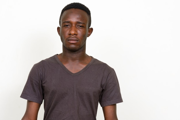 young African man isolated against white space