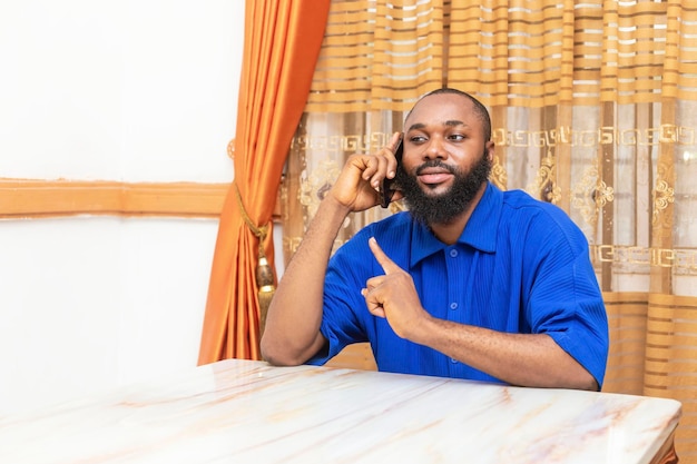 Young African Man Smiling Receiving Phone Call