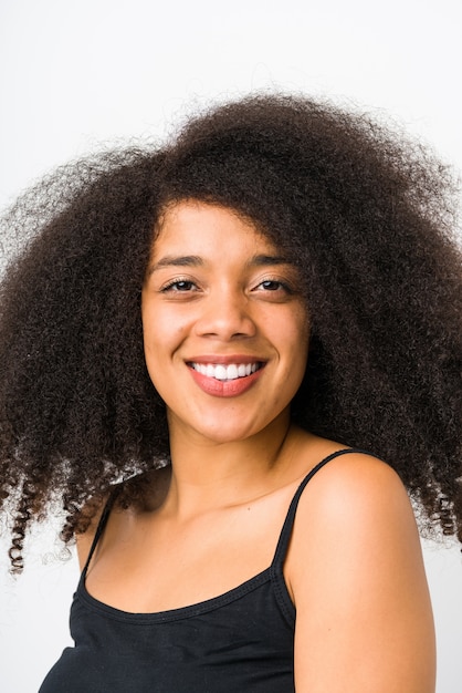 Young afro woman face close up