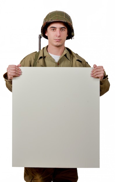 Young American soldier shows a sign