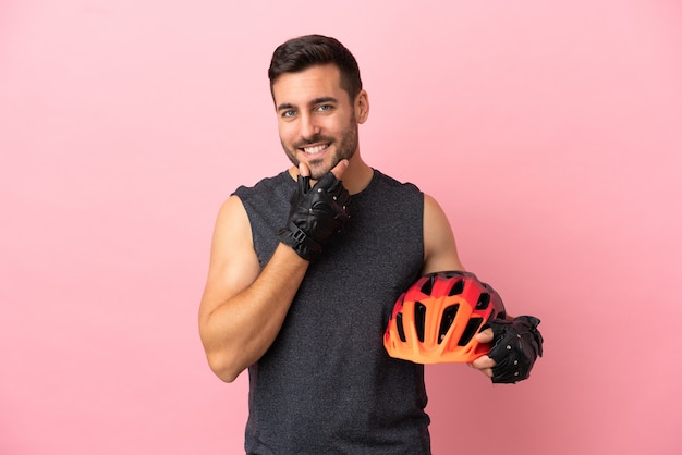 Young arab man isolated on blue background with surprise expression