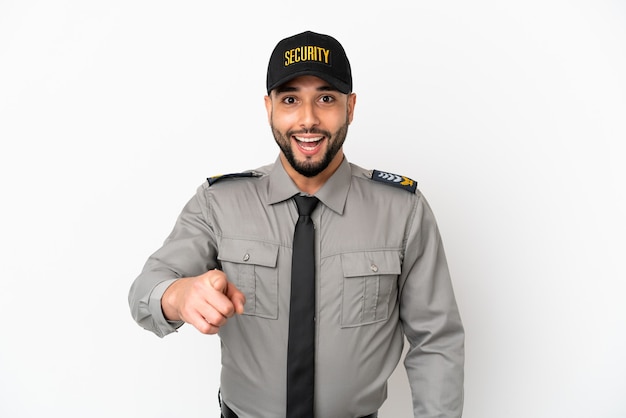 Young arab man isolated on white background surprised and pointing front