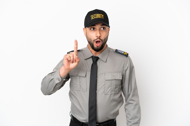 Young arab man isolated on white background thinking an idea pointing the finger up