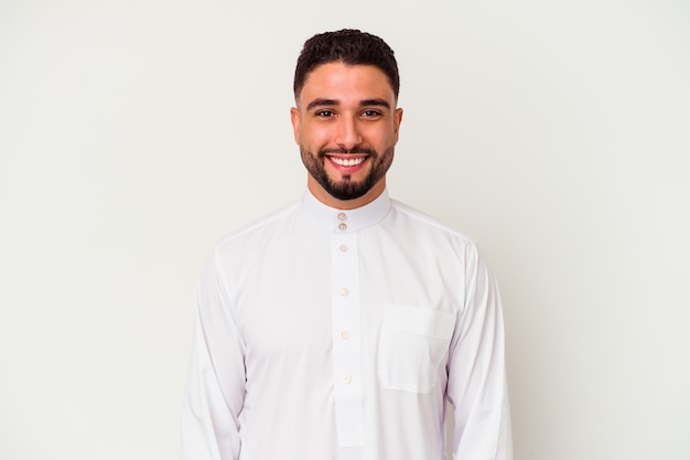 Young arab man wearing typical arab clothes isolated on white background happy, smiling and cheerful.