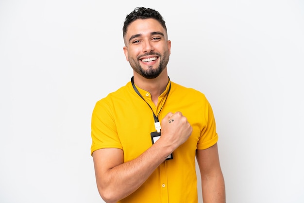 Young Arab man with ID card isolated on white background celebrating a victory