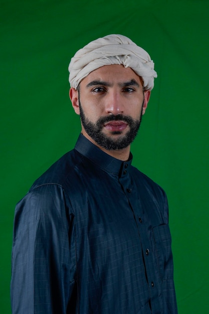 Young arab prince holding a bird of prey