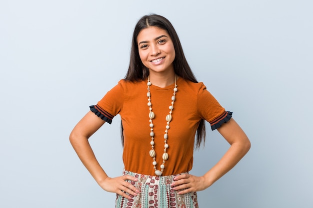 Young arab woman confident keeping hands on hips.