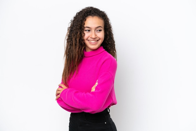 Young Arab woman isolated on white background with arms crossed and happy