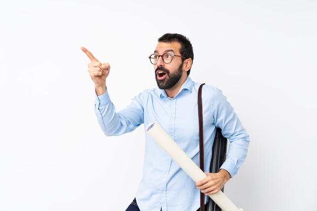 Young architect man with beard pointing away