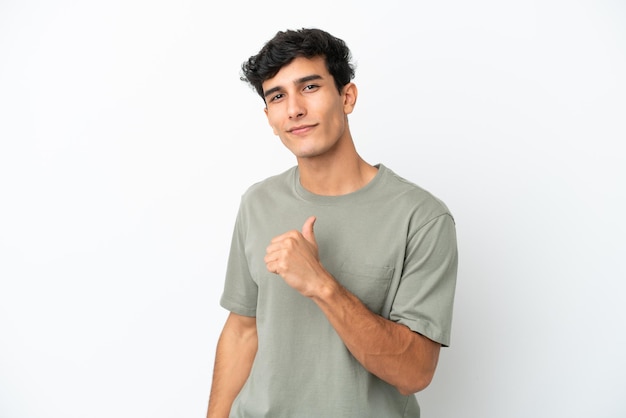 Young Argentinian man isolated on white background proud and selfsatisfied