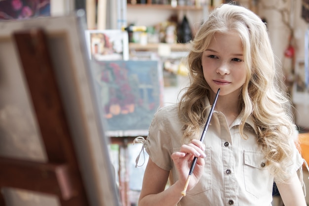 Young artist painting