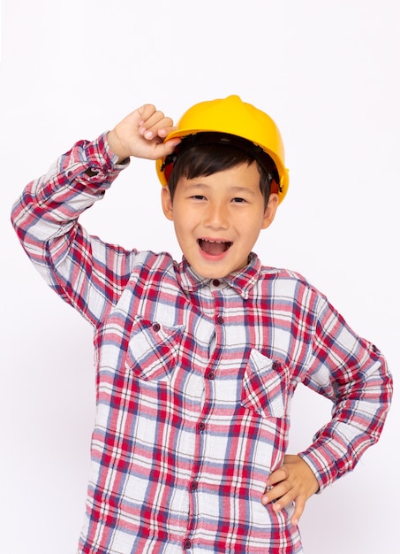 Young Asian boy in construction hat