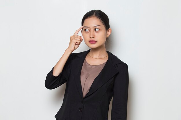 Young asian business woman thinks idea on white background