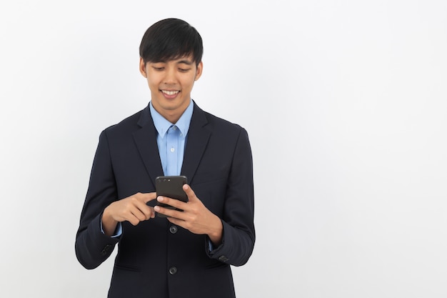 Young asian businessman in a dark suit