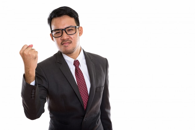 young Asian businessman looking motivated