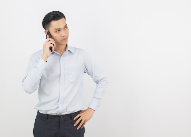 Young Asian Businessman making phone call