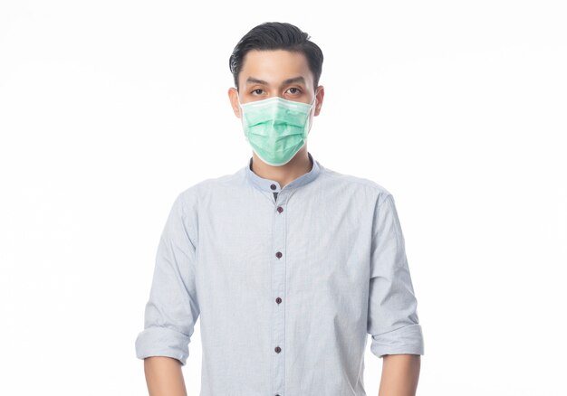 Young Asian Businessman wearing hygienic mask to prevent infection, coronavirus. Airborne respiratory illness such as pm 2.5 fighting and flu isolated on white background.