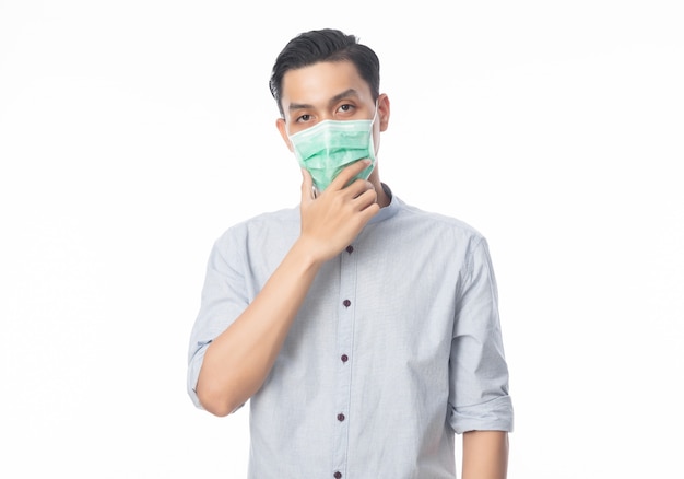 Young Asian Businessman wearing hygienic mask and thinking to prevent infection, 2019-nCoV or coronavirus. 