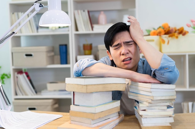 Young Asian businessman working at home